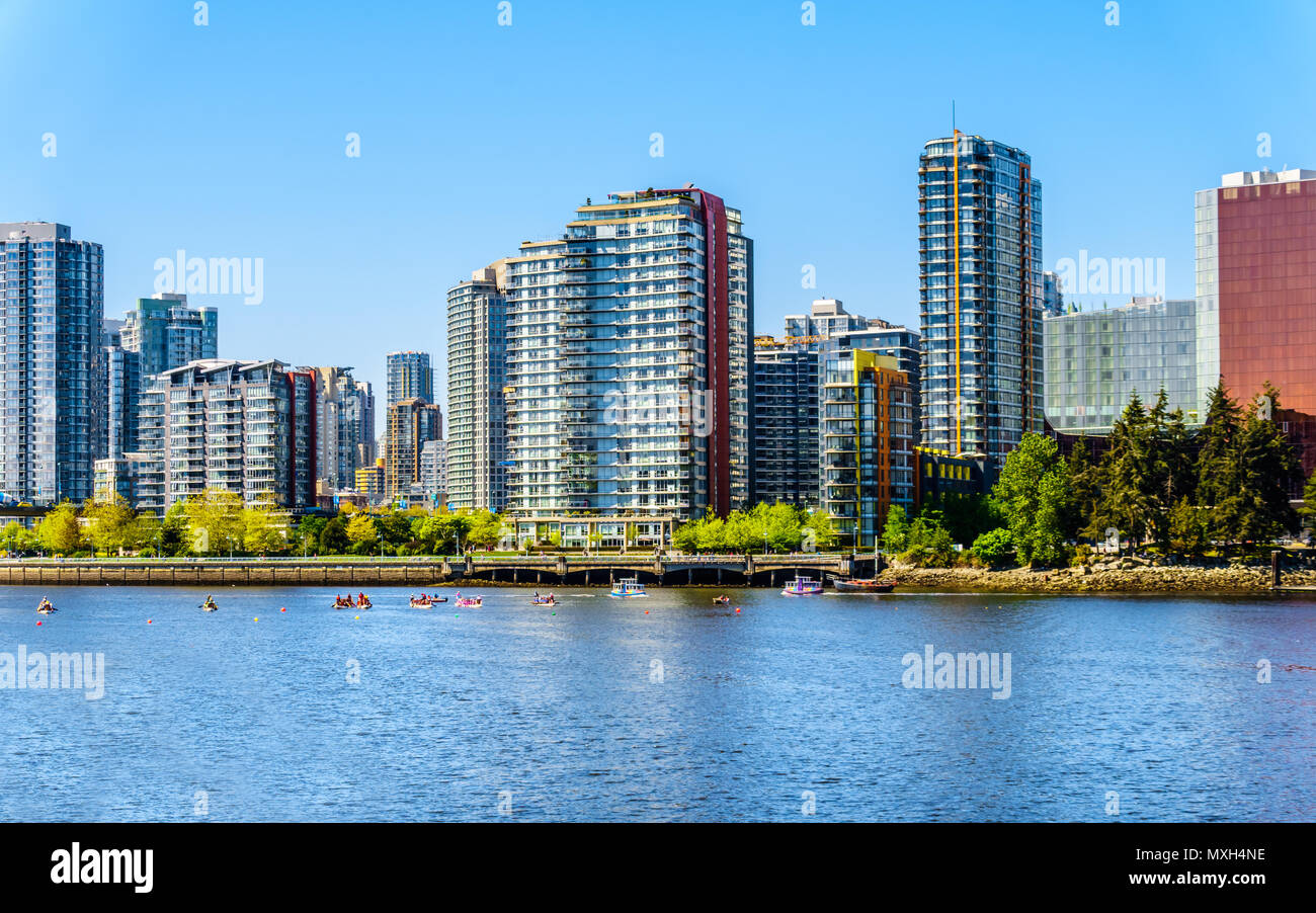 Famous and touristic False Creek and its surrounding apartments in the beautiful harbor of the city Vancouver in British Columbia, Canada Stock Photo