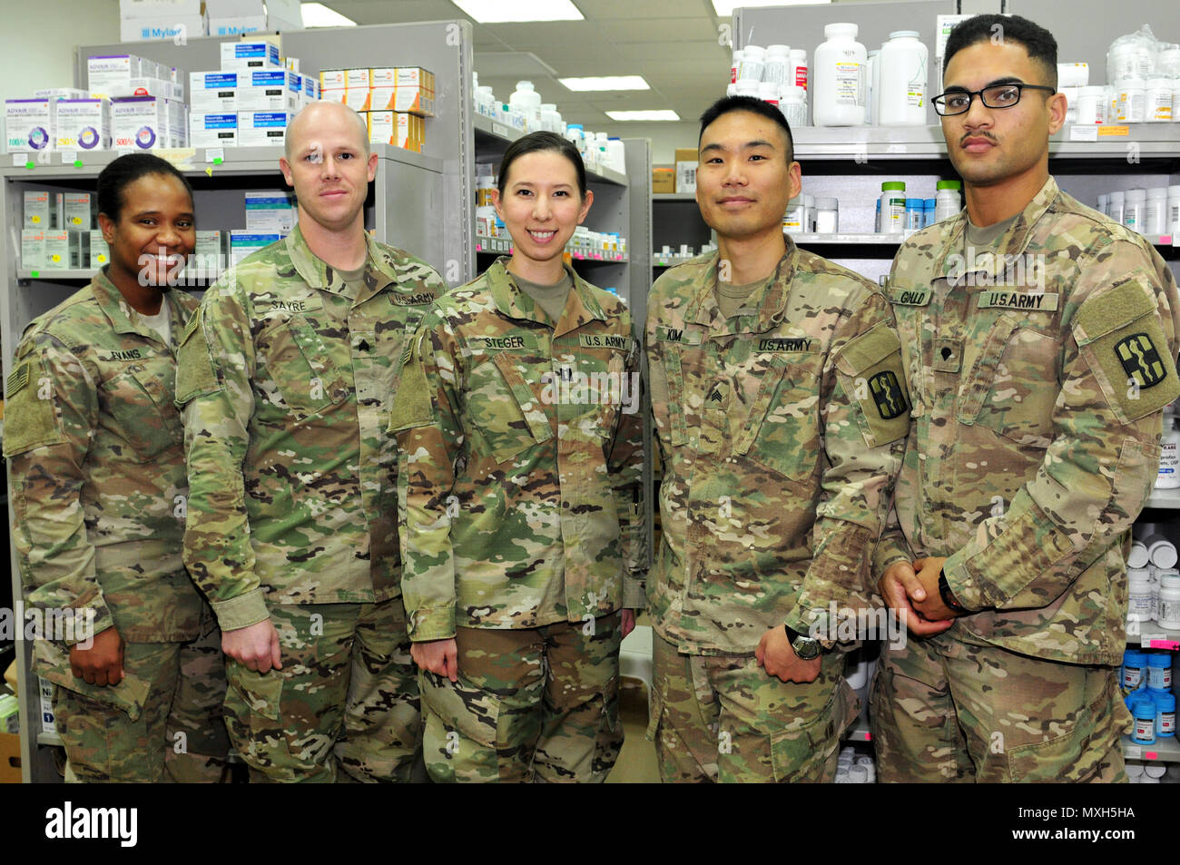 The 31st Combat Support Hospital pharmacy team provides pharmaceutical support to patients suffering from injuries and illnesses throughout the ARCENT area of operations. The team processes more than 3,500 outpatient prescriptions a month to service members and civilians while providing support to inpatient care and other facilities throughout the region. (U.S. Army photo by Sgt. Aaron Ellerman) Stock Photo