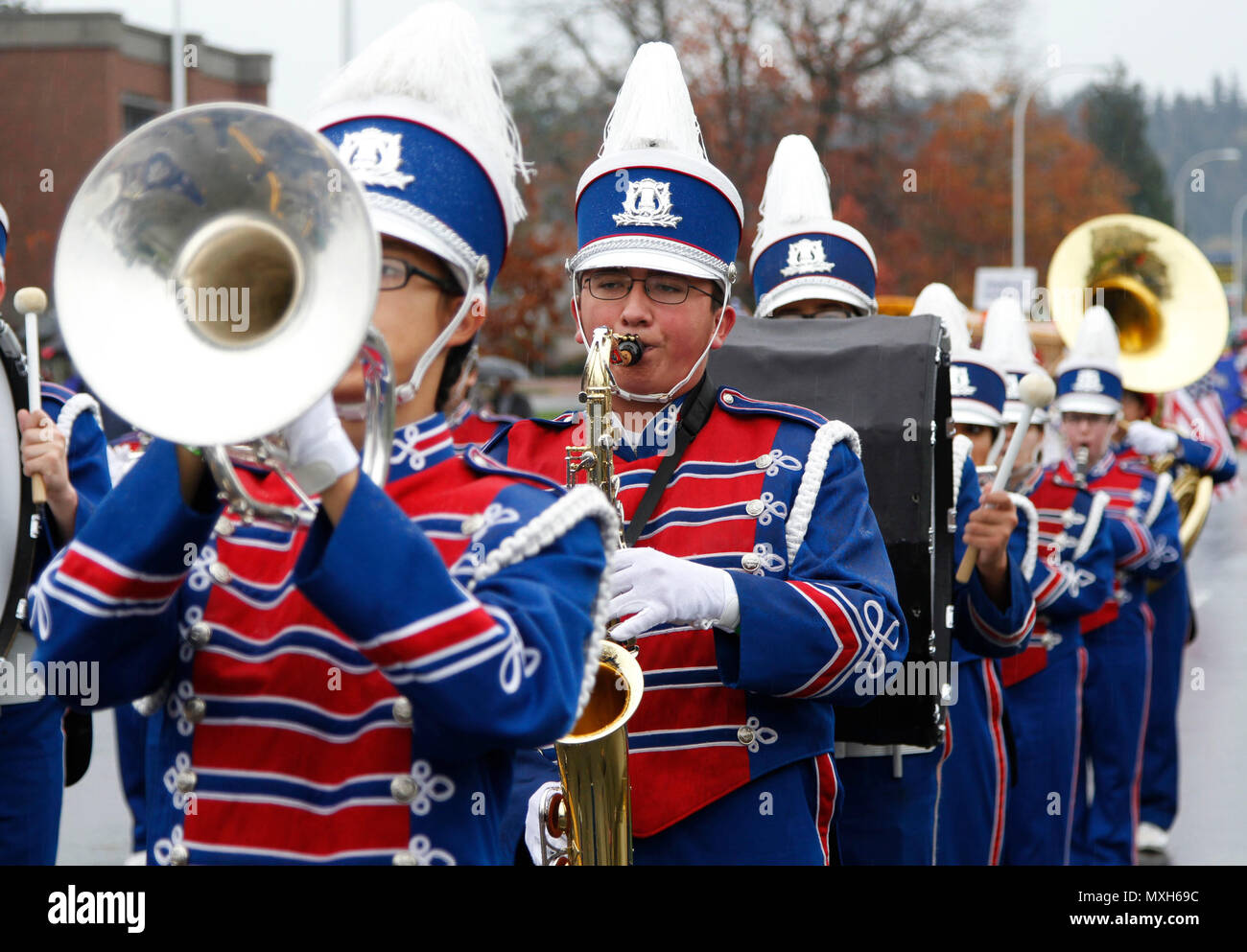 Twenty-six high school marching bands from across the state of Washington brought music for the 51st annual Auburn Veterans Day Parade Nov. 5, 2016. The Auburn Veterans Day Parade is one of the oldest and largest parades in the United States paying tribute to current military members and veterans. (U.S. Army photo by Spc. Sarah K. Anwar) Stock Photo