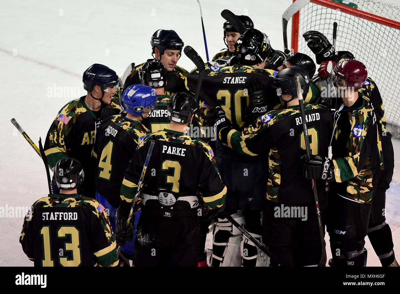 Army players celebrate the team's 60 win in the 22nd Annual Army vs