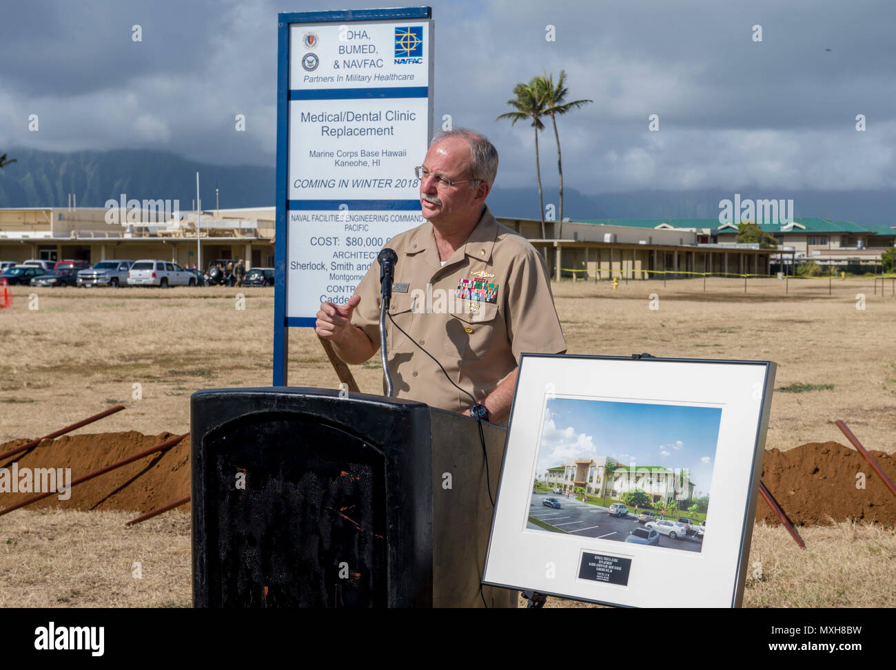 161108-N-YW024-027 KANEOHE BAY, Hawaii (Nov. 8, 2016)  Rear Adm. Bruce Gillingham, commander, Navy Medicine West, San Diego, delivers opening remarks during a groundbreaking ceremony for Naval Medical and Dental Replacement Clinic at Marine Corps Base Hawaii (MCBH). The new medical and dental clinic will provide Navy Medicine and Marine Forces Medical personnel with state-of-the-art working spaces to keep the Navy and Marine Corps operational forces ready, healthy and on the job. (U.S. Navy photo by Petty Officer 2nd Class Katarzyna Kobiljak) Stock Photo