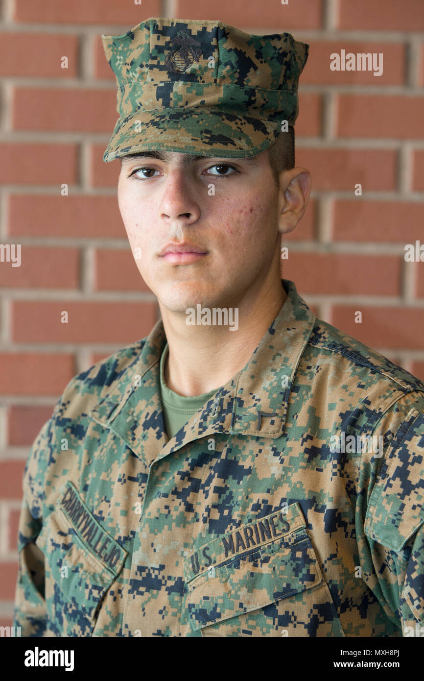 Pfc. Juan D. Charry Vallejo, Platoon 3093, Mike Company, 3rd Recruit Training Battalion, earned U.S. citizenship Nov. 9, 2016, on Parris Island, S.C. Before earning citizenship, applicants must demonstrate knowledge of the English language and American government, show good moral character and take the Oath of Allegiance to the U.S. Constitution. Charry Vallejo, from Queens, N.Y., originally from Colombia, is scheduled to graduate Nov. 10, 2016. (Photo by Cpl. Vanessa Austin) Stock Photo