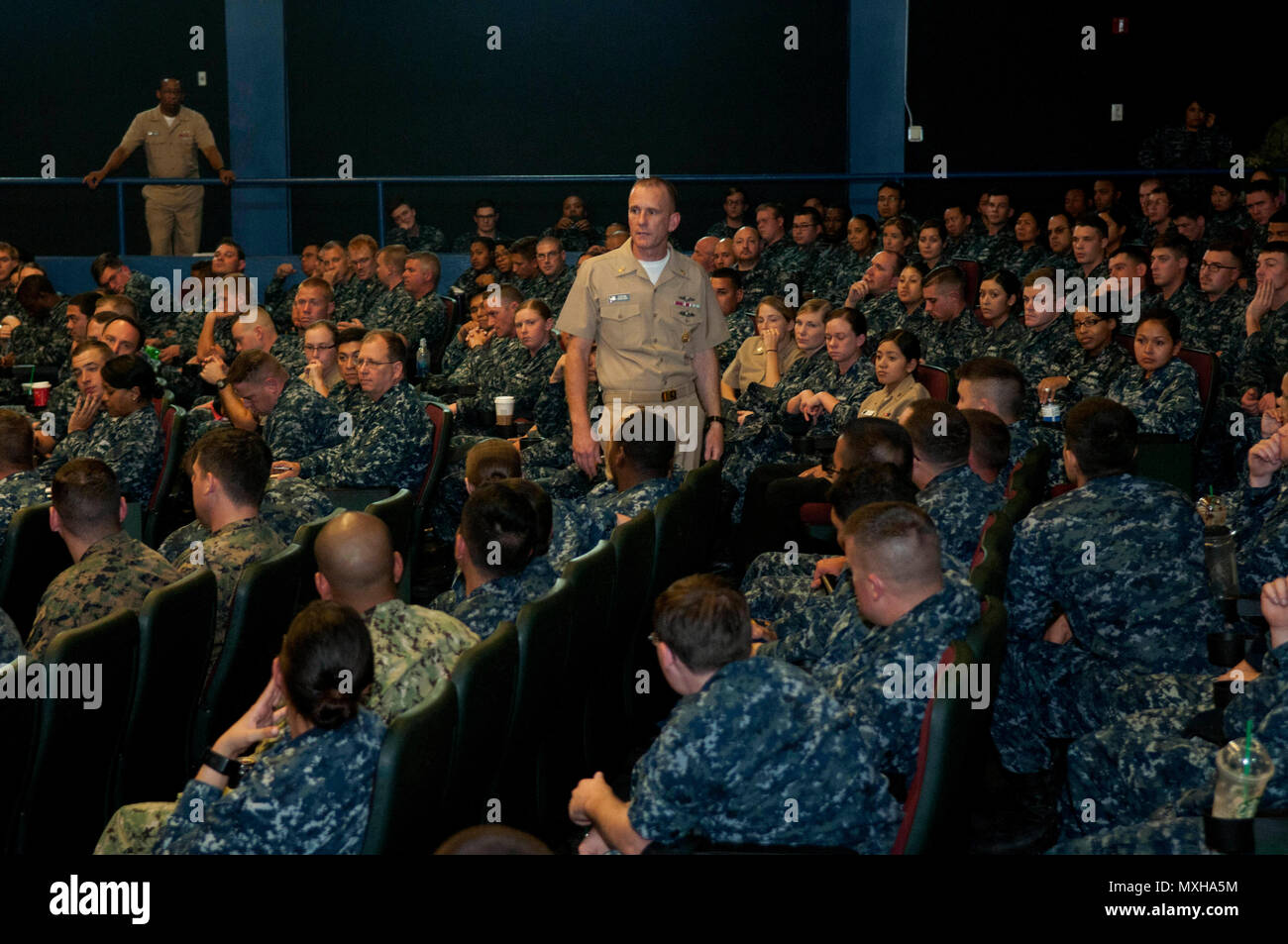 161108-N-ZF498-085 SAN DIEGO (Nov. 8, 2016) The 14th Master Chief Petty Officer of the Navy (MCPON) Steven Giordano speaks with Sailors during an all-hands call at Naval Base San Diego. MCPON addressed current issues in the Navy and participated in a question-and-answer session with Sailors. This is Giordano's first visit to Naval Base San Diego since taking office as the 14th MCPON.  (U.S. Navy photo by Petty Officer 3rd Class Anthony N. Hilkowski/Released) Stock Photo