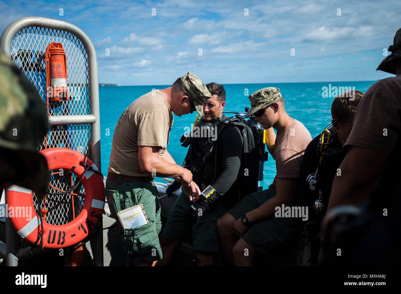 Members of the U.S. Navy Underwater Construction Team (UCT) 2, assigned ...