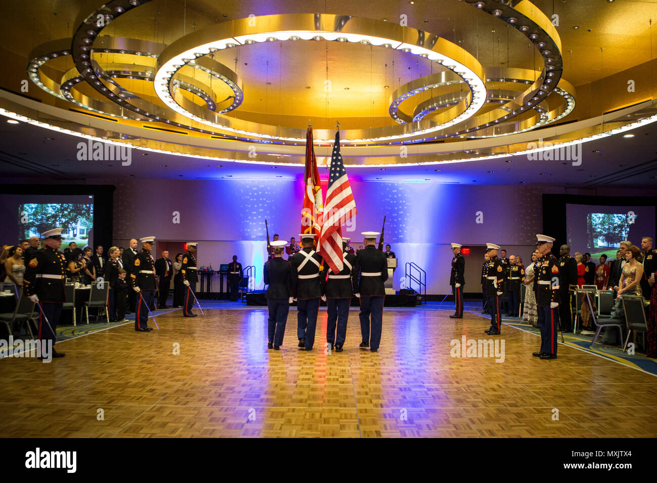 The Headquarters & Service Battalion Color Guard present colors during the Headquarters & Service Battalion Marine Corps Ball at the Renaissance Arlington Capitol View Hotel, Arlington, Va., Nov. 05, 2016. The ball was held in celebration of the Marine Corps’ 241st birthday. (U.S. Marine Corps photo by Pfc. Alex A. Quiles) Stock Photo