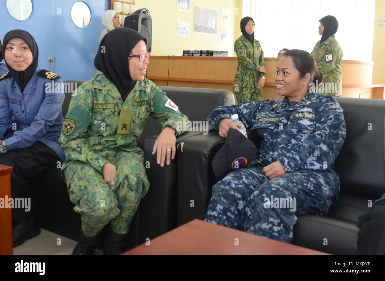 161115-N-WJ640-002 BRUNEI (Nov. 15, 2016) Senior Chief Vilma Rodriguez,  attached to Commander Logistics Group Western Pacific, participates in a  women's symposium with members of the Royal Brunei Armed Forces during  Cooperation Afloat