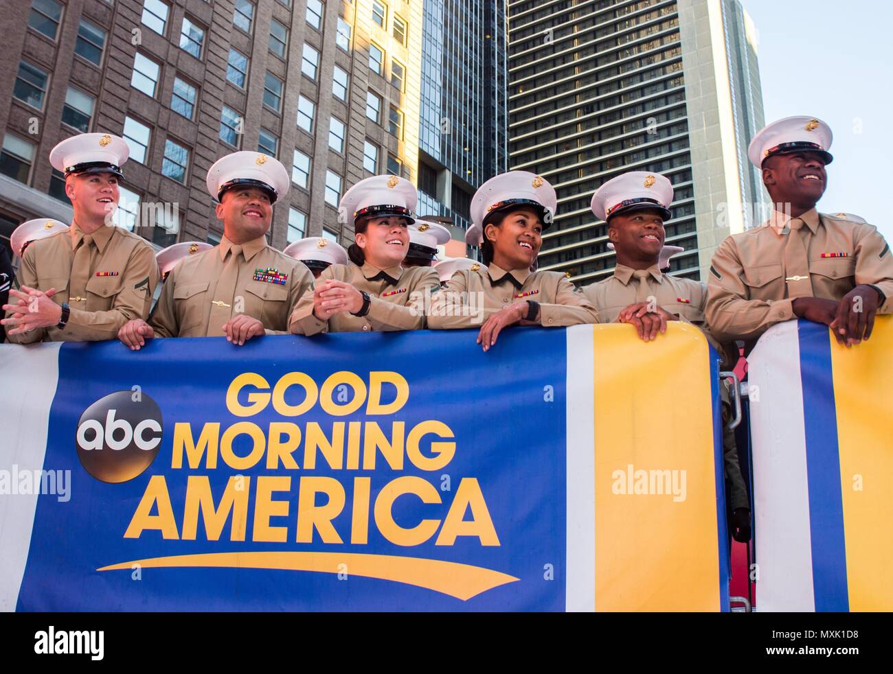 Marines wait for their chance to be seen on the ABC Good Morning America television show at Times Square in New York City, N.Y., Nov. 11, 2016. Marines from local units are participating in Veterans Week New York City 2016 to honor the service of all our nation’s veterans. The Marines are with II Marine Expeditionary Unit. (U.S. Marine Corps Photo by Sgt. Anthony Mesa.) Stock Photo