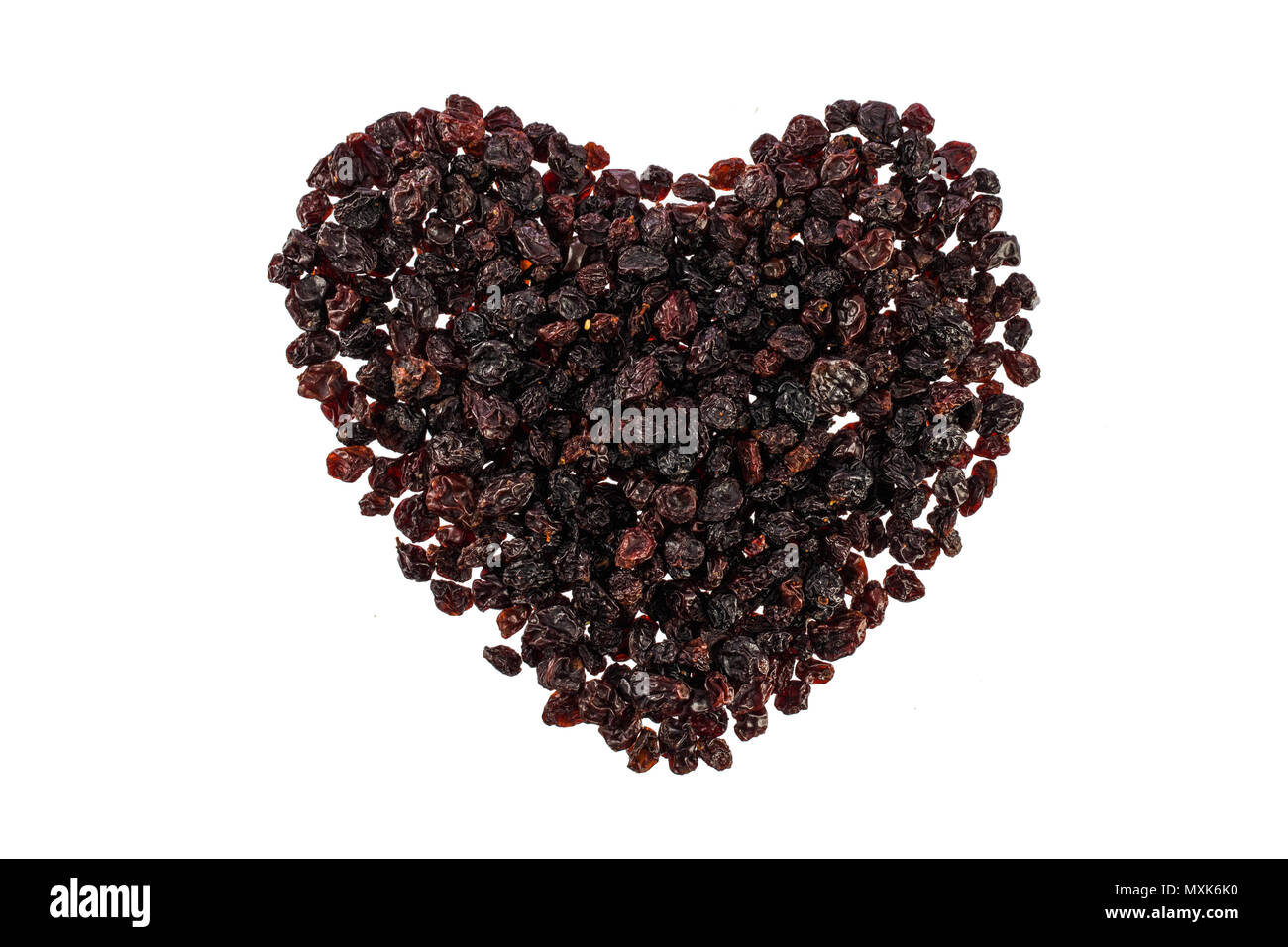Dried black cherries isolated on white background Stock Photo Alamy