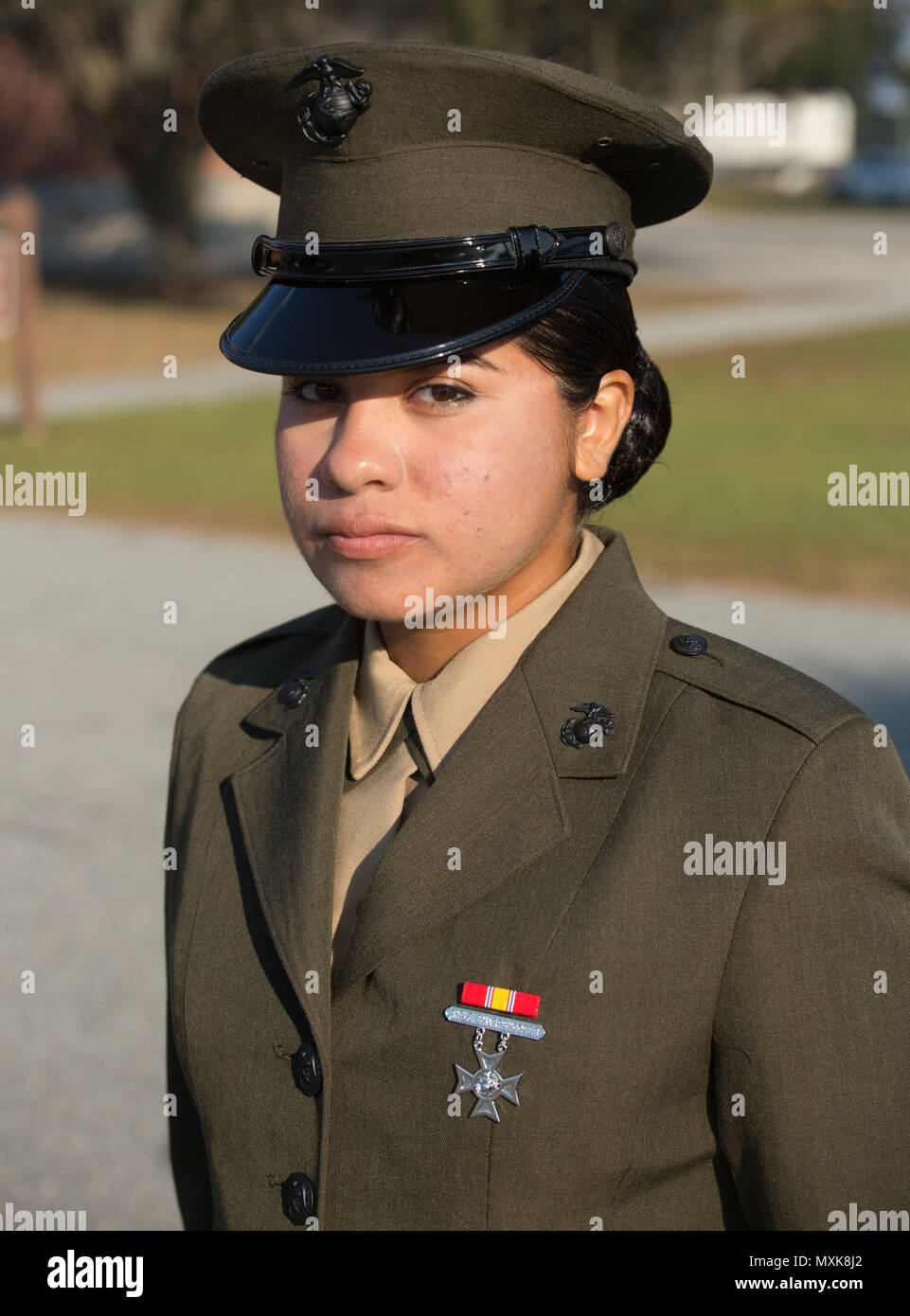 Pvt. Lupita Rodriguez, with Platoon 4040, Oscar Company, 4th Recruit Training Battalion, earned the company's highest physical fitness and combat fitness score. Rodriguez, a native of Elkhart, Ind., earned a score of 600 out of 600 points and graduated boot camp Nov. 18, 2016. (Photos by Lance Cpl. Maximiliano Bavastro) Stock Photo