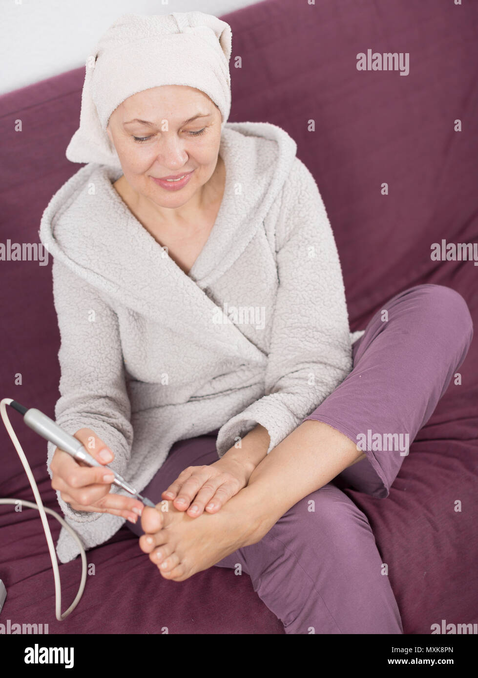 Mature woman feet hi-res stock photography and images - Alamy