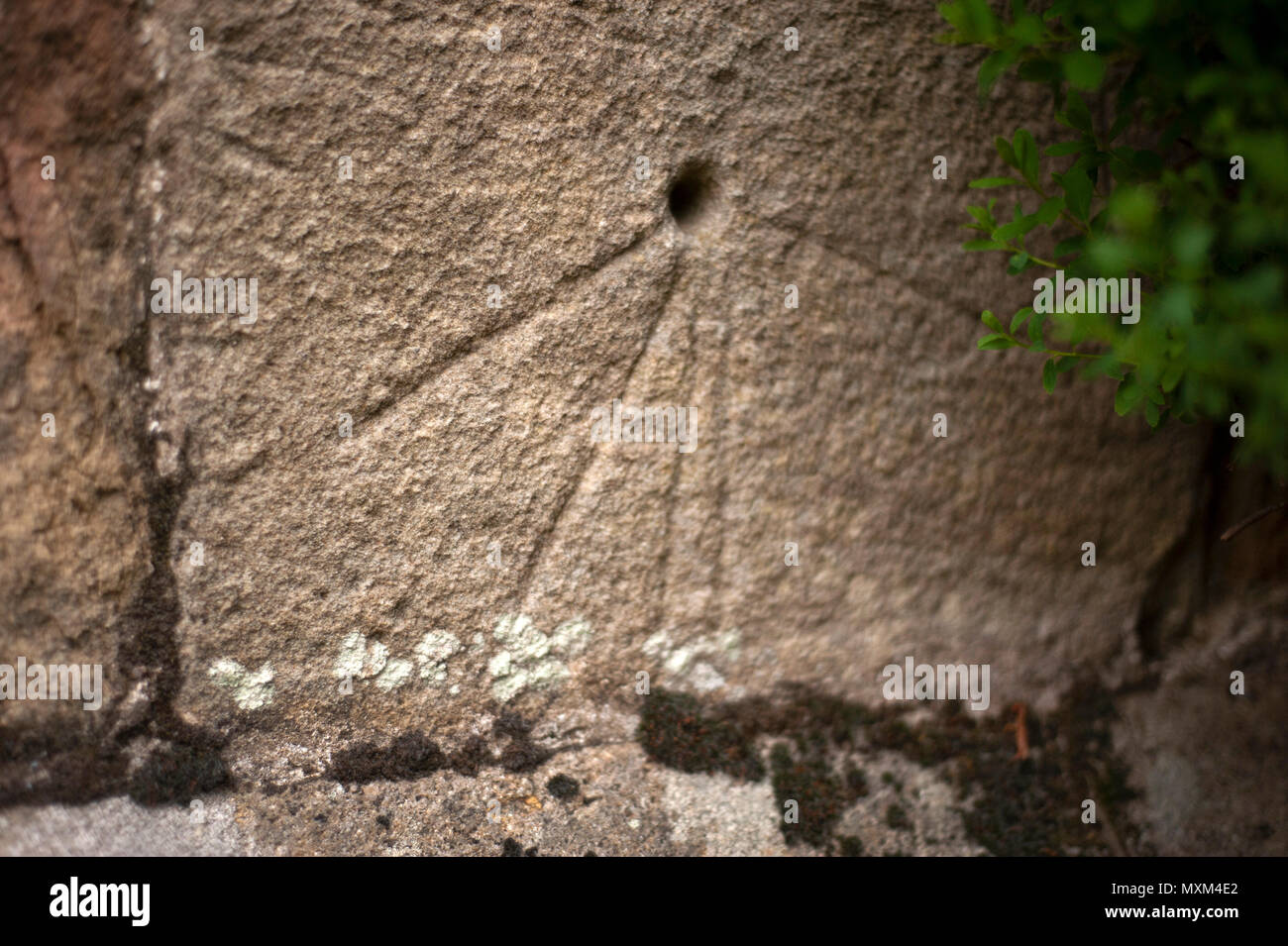 Scratch dial clock / mass dial on wall of St Peter's Church, Bywell ...