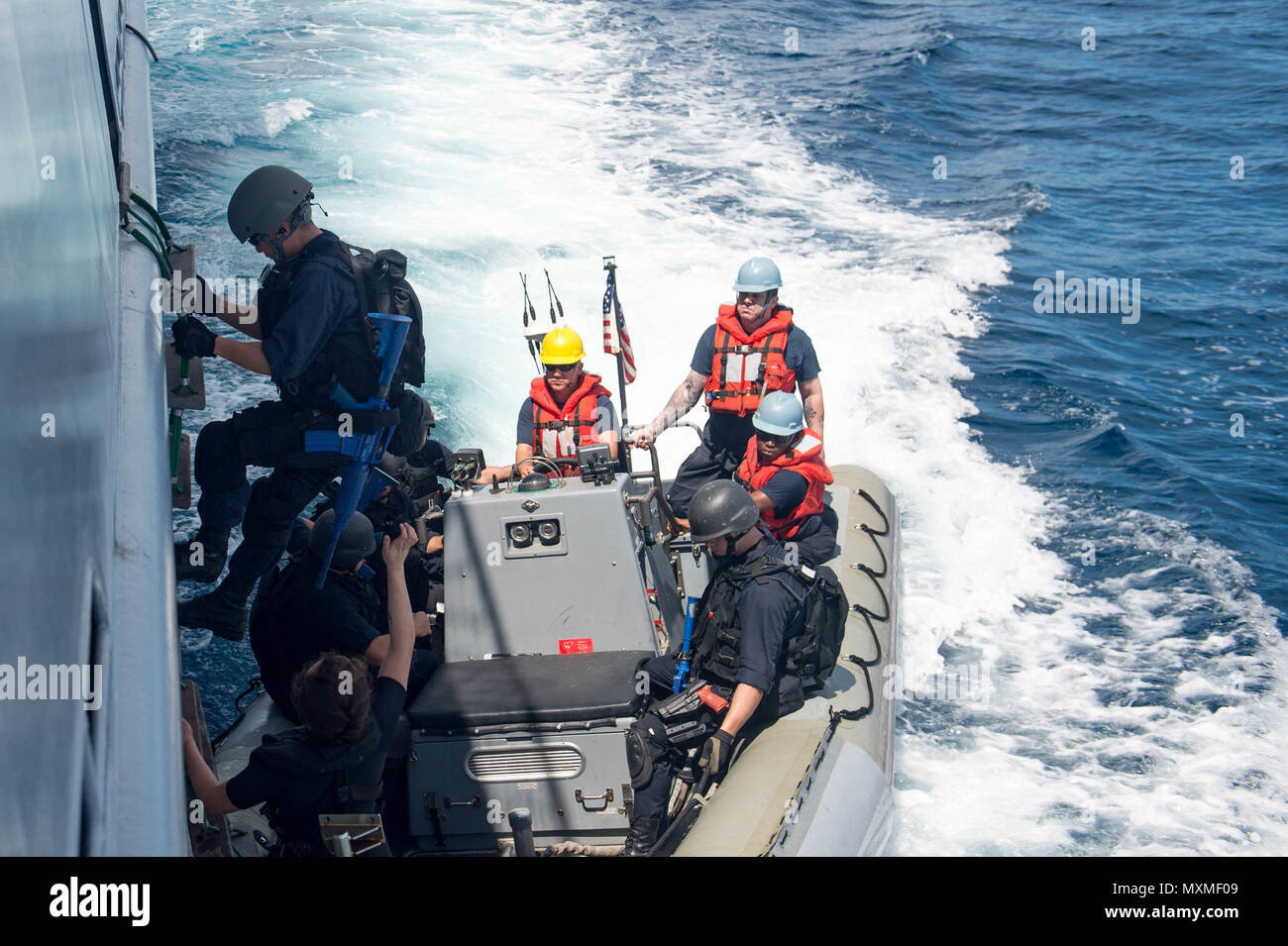 161117 N Nt265 422 South China Sea Nov 17 2016 A Sailor Assigned To The Forward Deployed Arleigh Burke Class Guided Missile Destroyer Uss Mccampbell Ddg 85 Disembarks The Royal Brunei Navy Ship Kdb Darussalam To A Rigid
