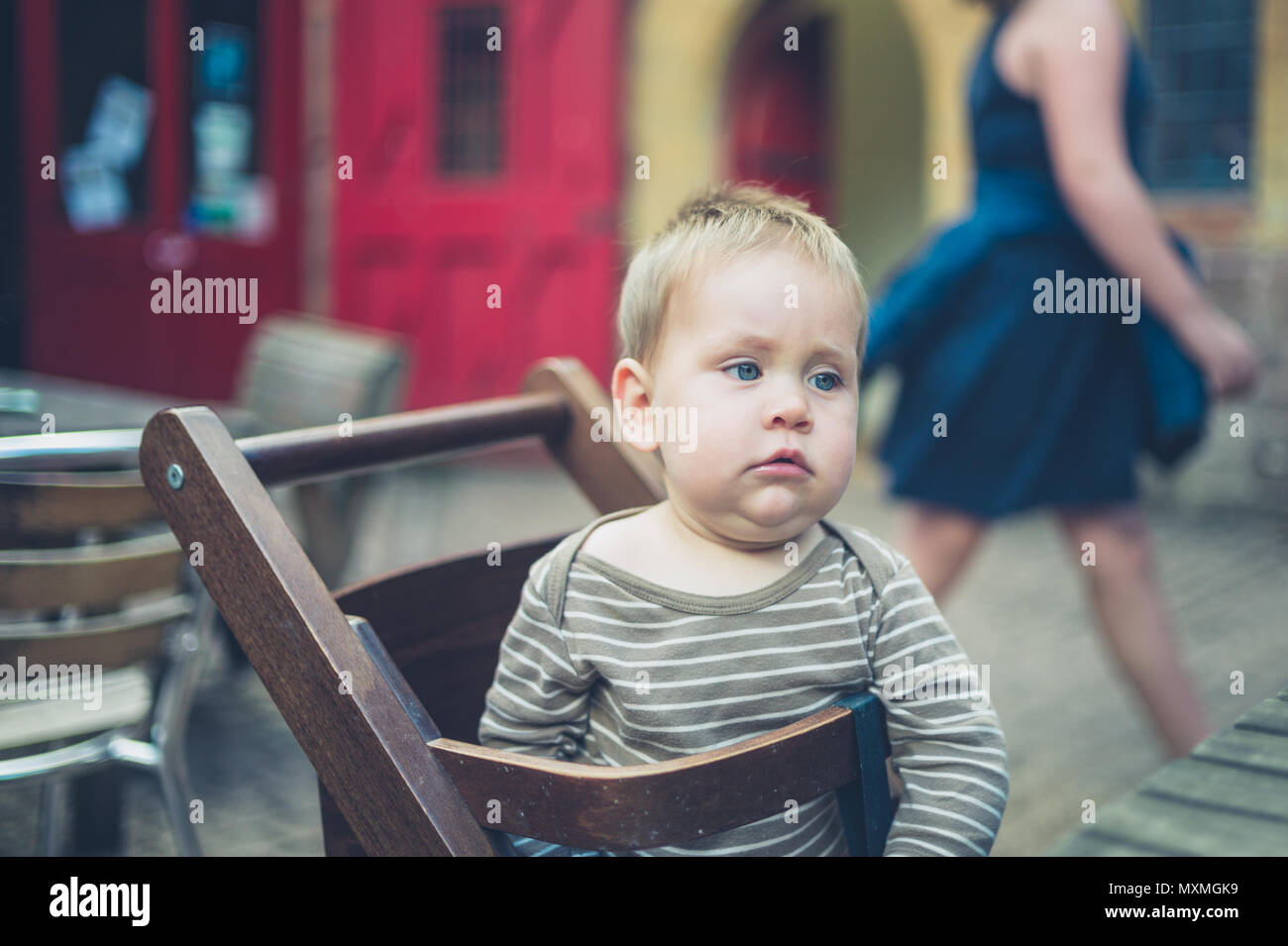 Boy girl sitting on chair hires stock photography and images Alamy