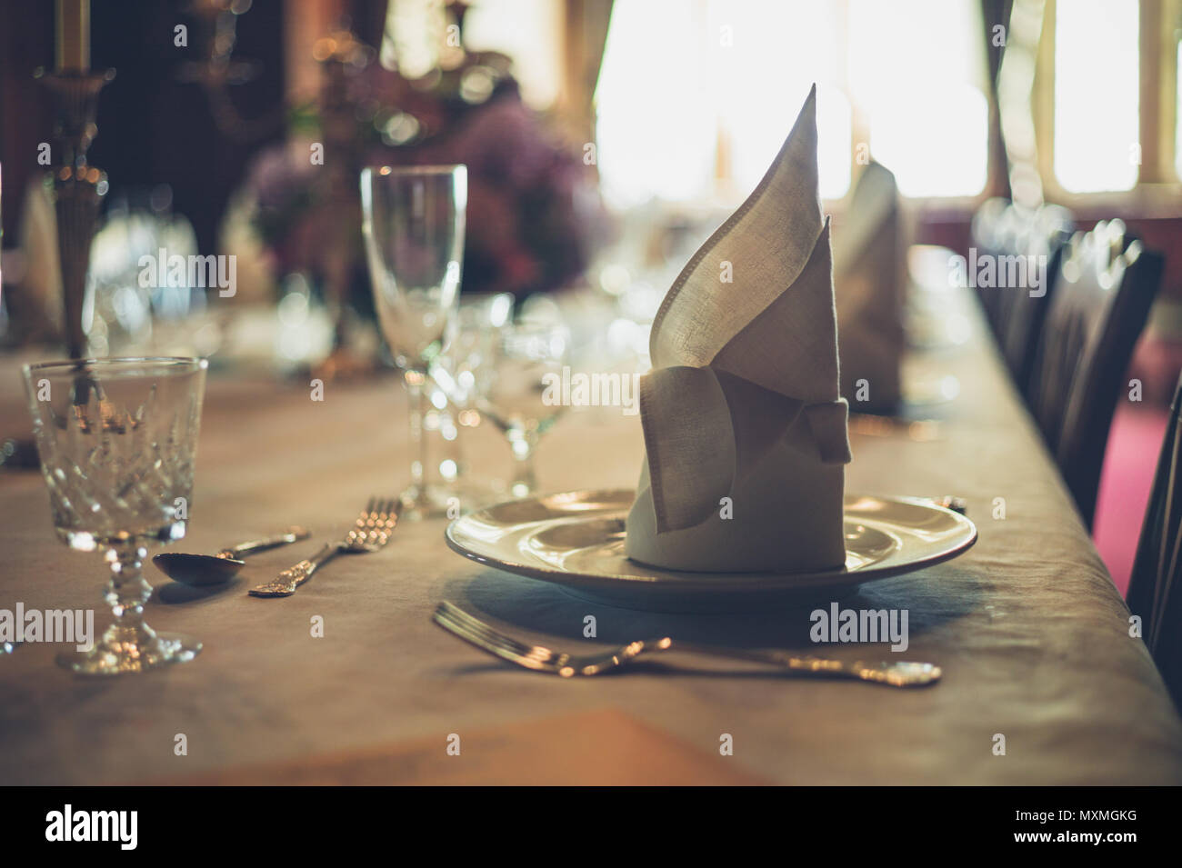 A formal table setting with silverware Stock Photo - Alamy
