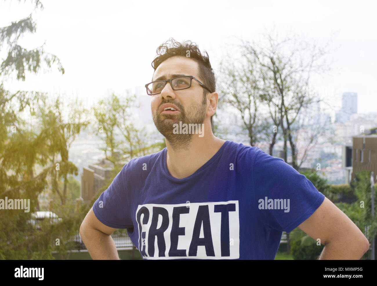 confused and considerate young man studio portrait Stock Photo