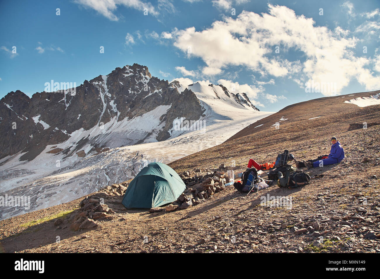 tent in the mountains. alpine camp. climbing and hiking Stock Photo - Alamy