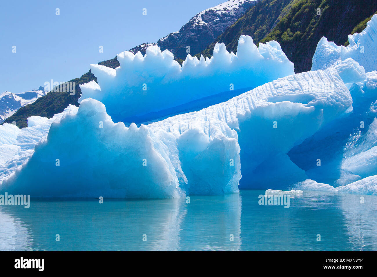 Ice melting at Sawyer glacier, Tracy Arm Fjord, Alaska, North Pacific, USA Stock Photo