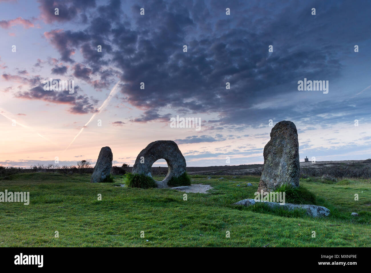 Pre-Dawn Light Illuminating the Men-an-Tol Standing Stones Near Madron, Cornwall, UK Stock Photo