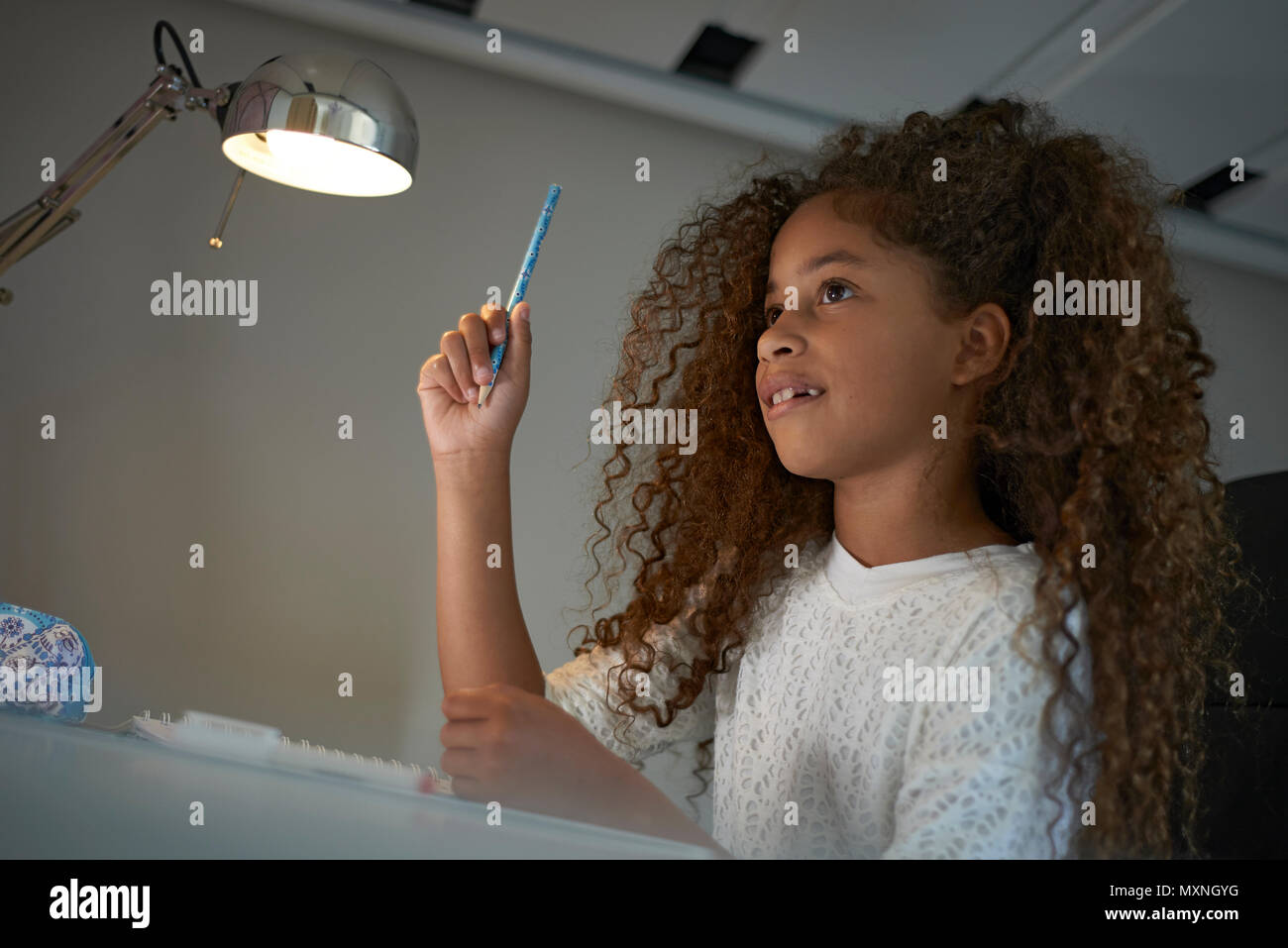 Portrait Of A Young Preteen Mixed Race Girl With Big Curly Hair