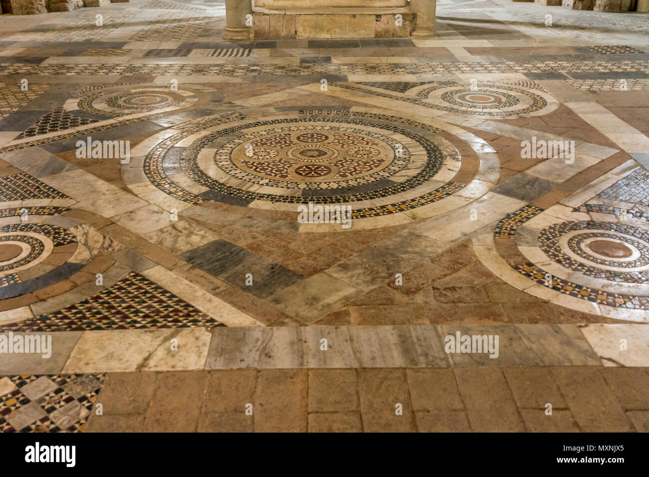 Tuscania (Viterbo), Italy  Interior of San Pietro Church, details of the Cosmatesque Pavements with geometric decorativ inlay-Italy, Lazio region Stock Photo