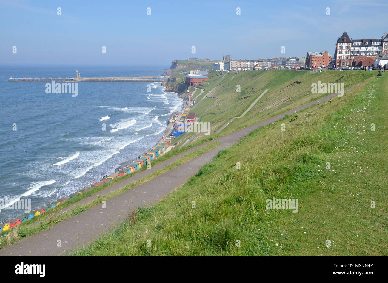 The West Cliff area of Whitby, North Yorkshire, with the piers to the