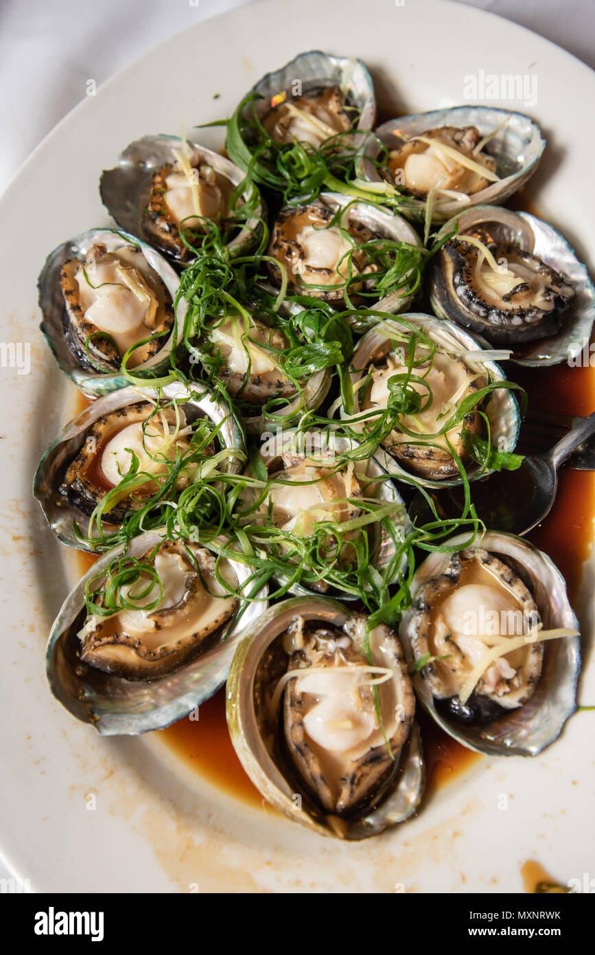 Steamed abalone dish at a chinese restaurant a very popular dish at