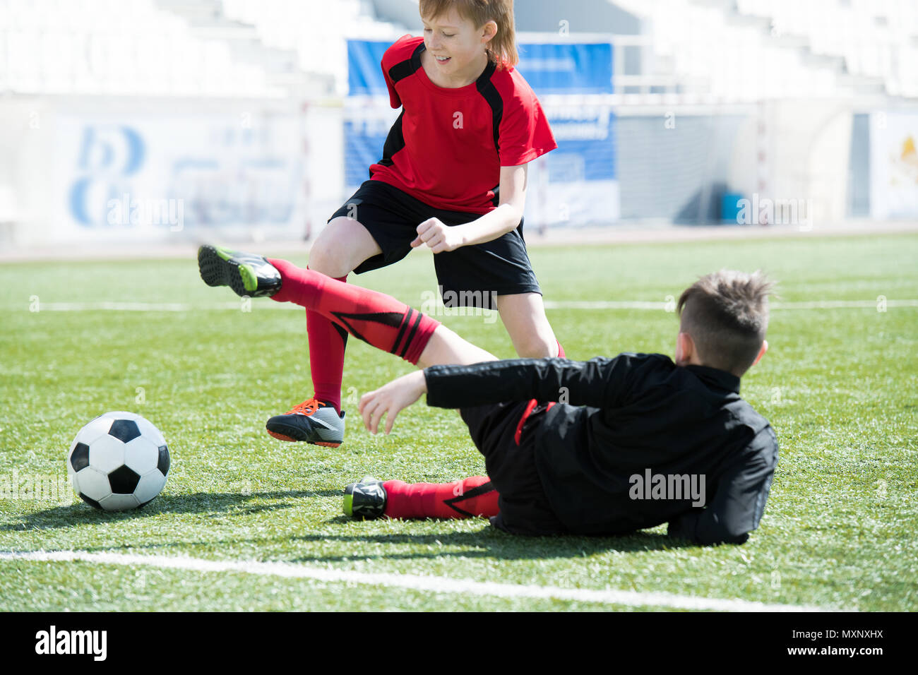 Children in Football Match Stock Photo