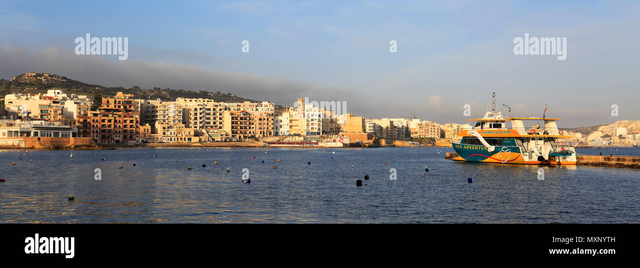 Summer view over Bugibba promenade, Saint Pauls Bay, Bugibba town, Malta. Stock Photo