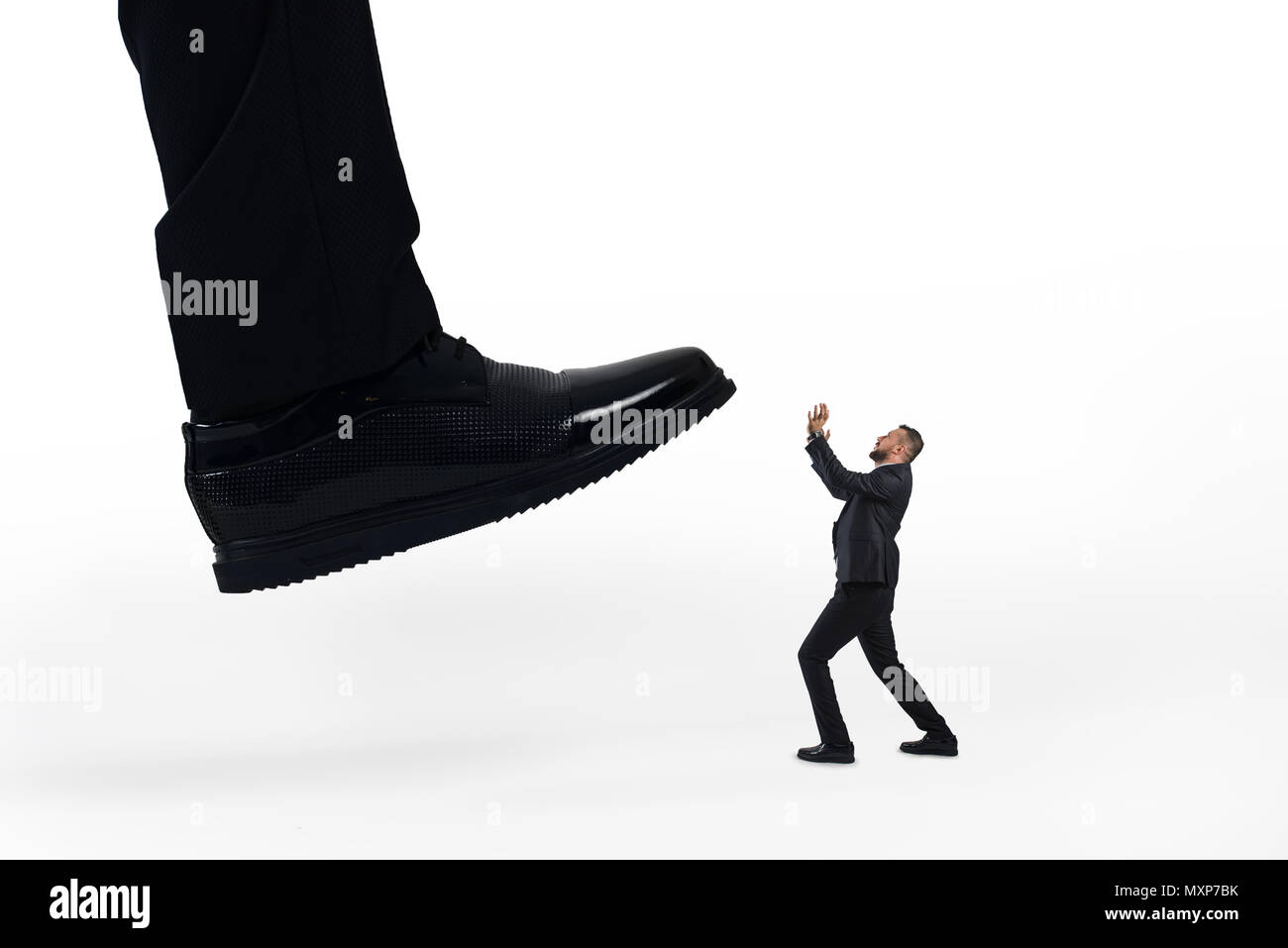 Aggressive boss with stressful empoyee . Mobbing concept. Stock Photo