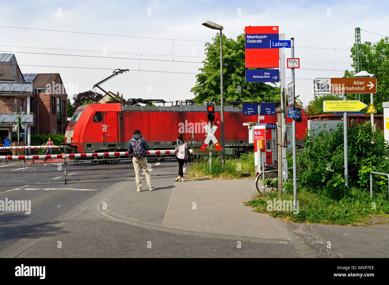 Pedestrians Waiting At Level Crossing Meerbusch Osterath Germany Stock Photo Alamy