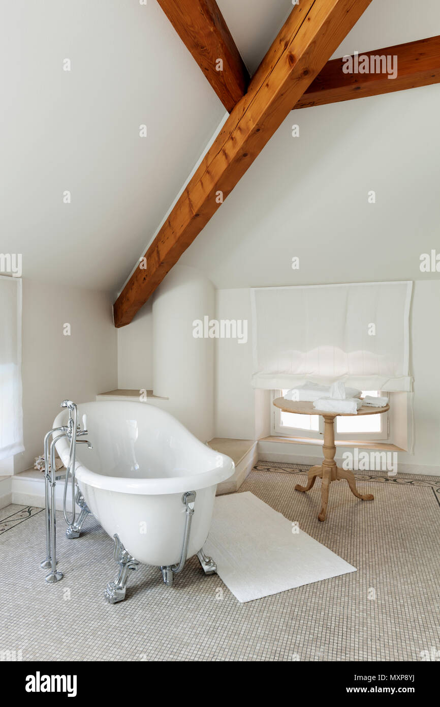 Interior of a mansion, luxury classic bathroom with  white tub Stock Photo