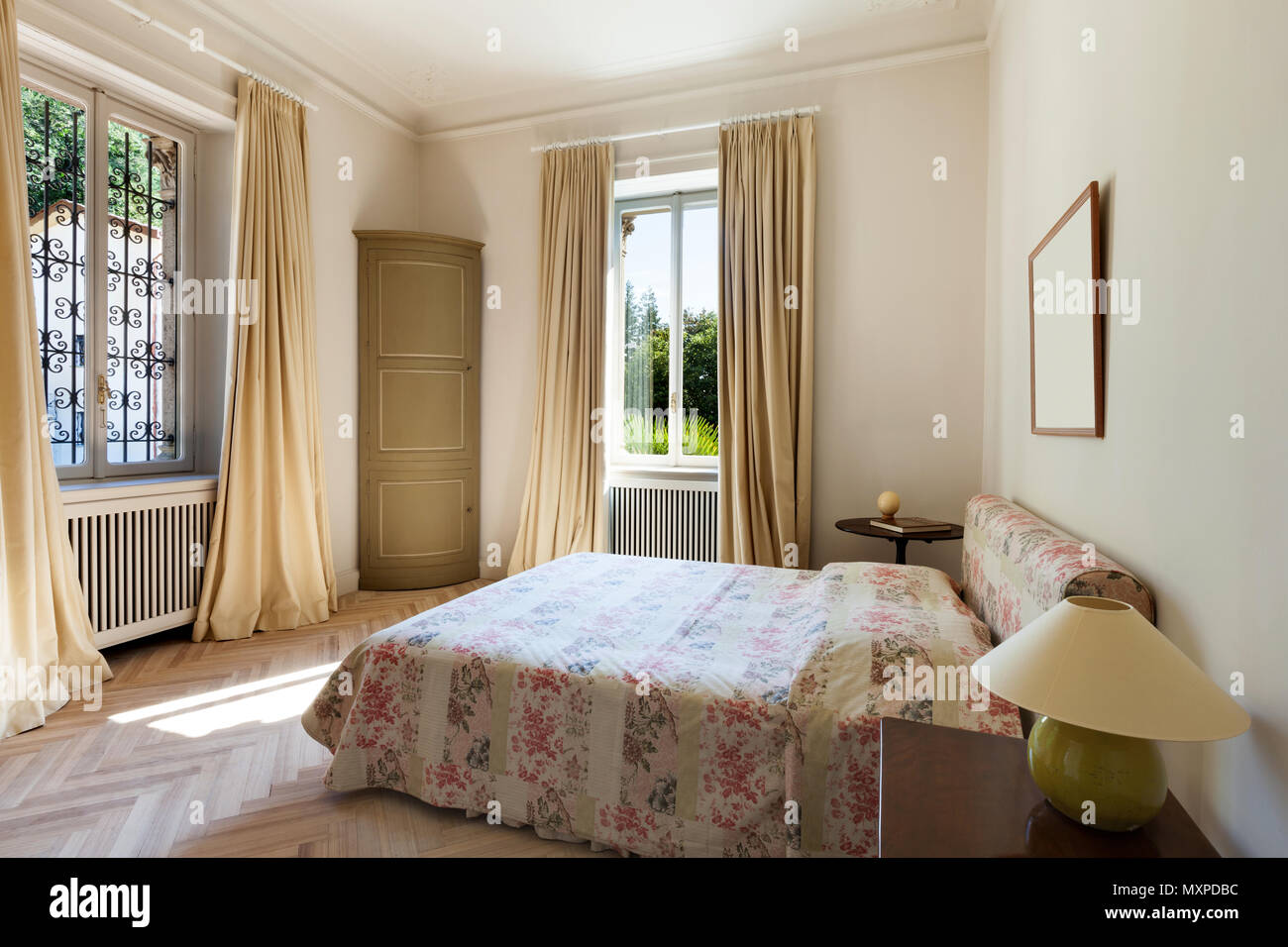 Interior of an old mansion, new bedroom in classical style Stock Photo - Alamy