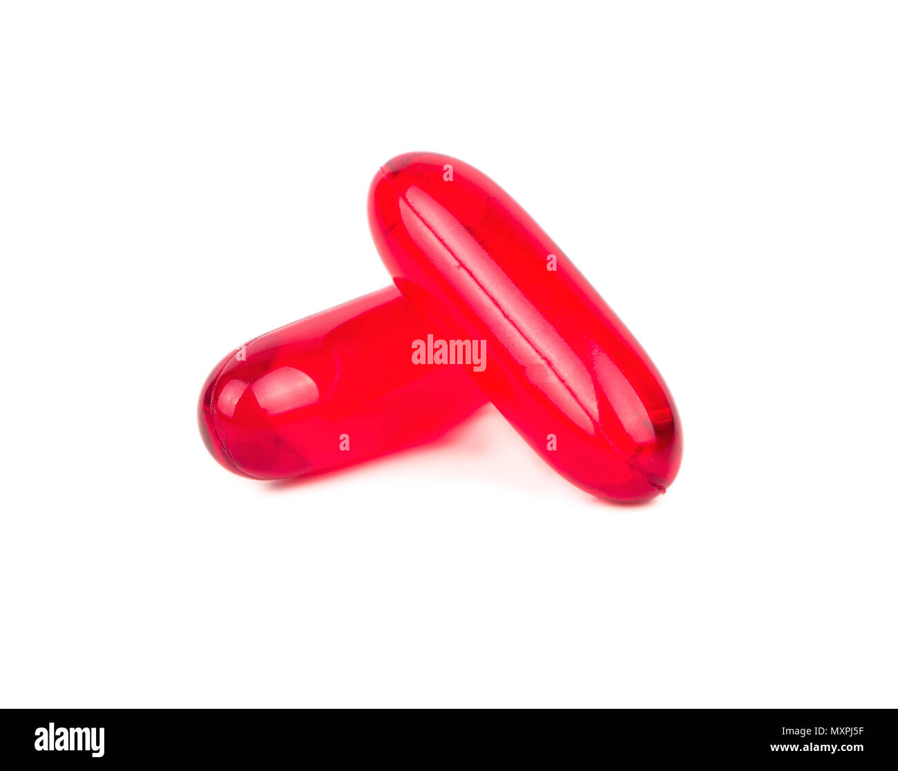two red pill capsule isolated on white background stock photo