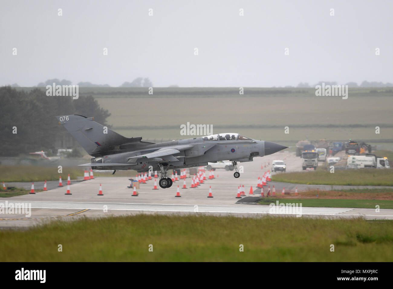A Tornado GR4 comes in to land at RAF Marham, as construction work continues at the base in Norfolk, ahead of the arrival of the new F-35B Lightning stealth fighter jets later this week. Stock Photo