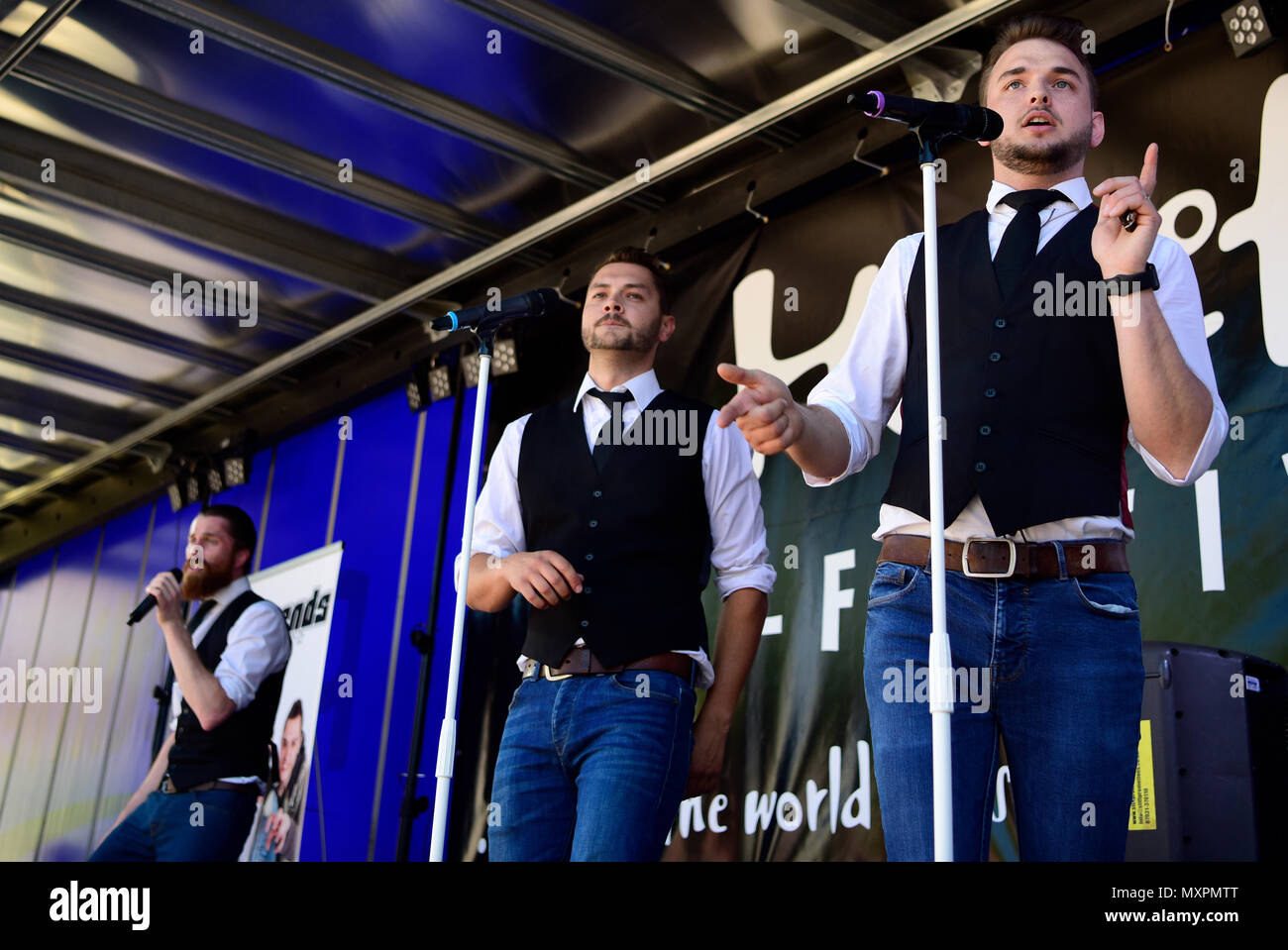 Legends, a 3-piece Boy Band Tribute, performing at Petersfield Spring Festival, The Square, Petersfield, Hampshire, UK. Stock Photo