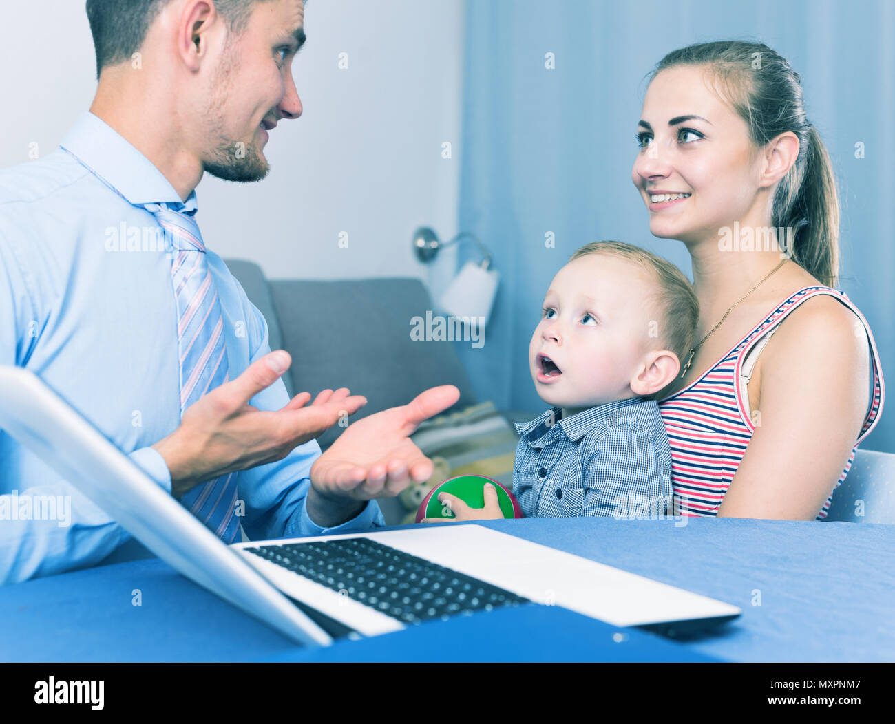 Manager of notebook marketing company talking about bioadditives to woman Stock Photo