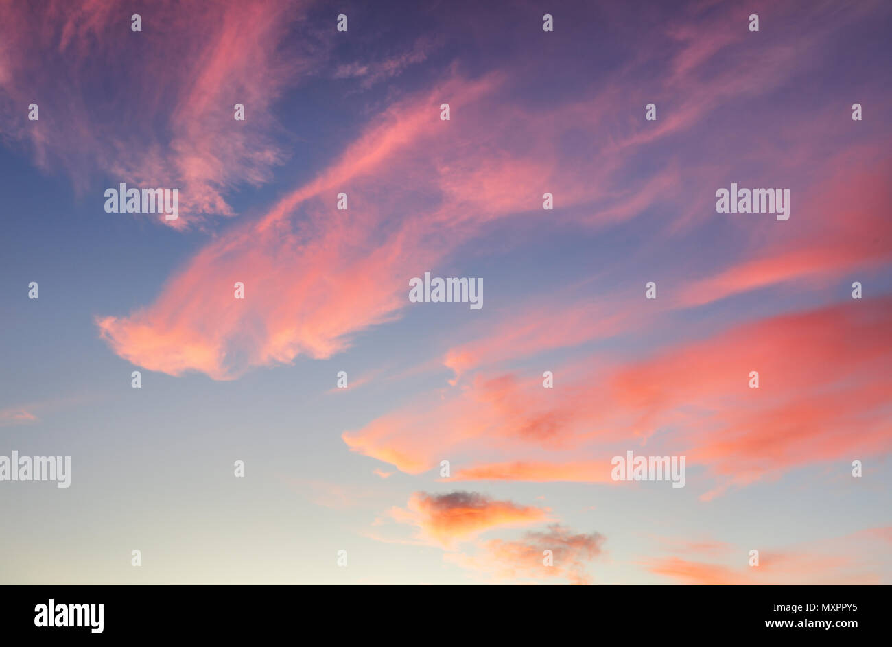 Red sky with blue clouds Stock Photo - Alamy