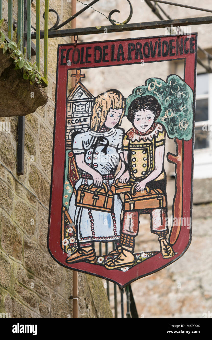 School sign in Moncontour, Côtes-d'Armor, Brittany, France. Stock Photo