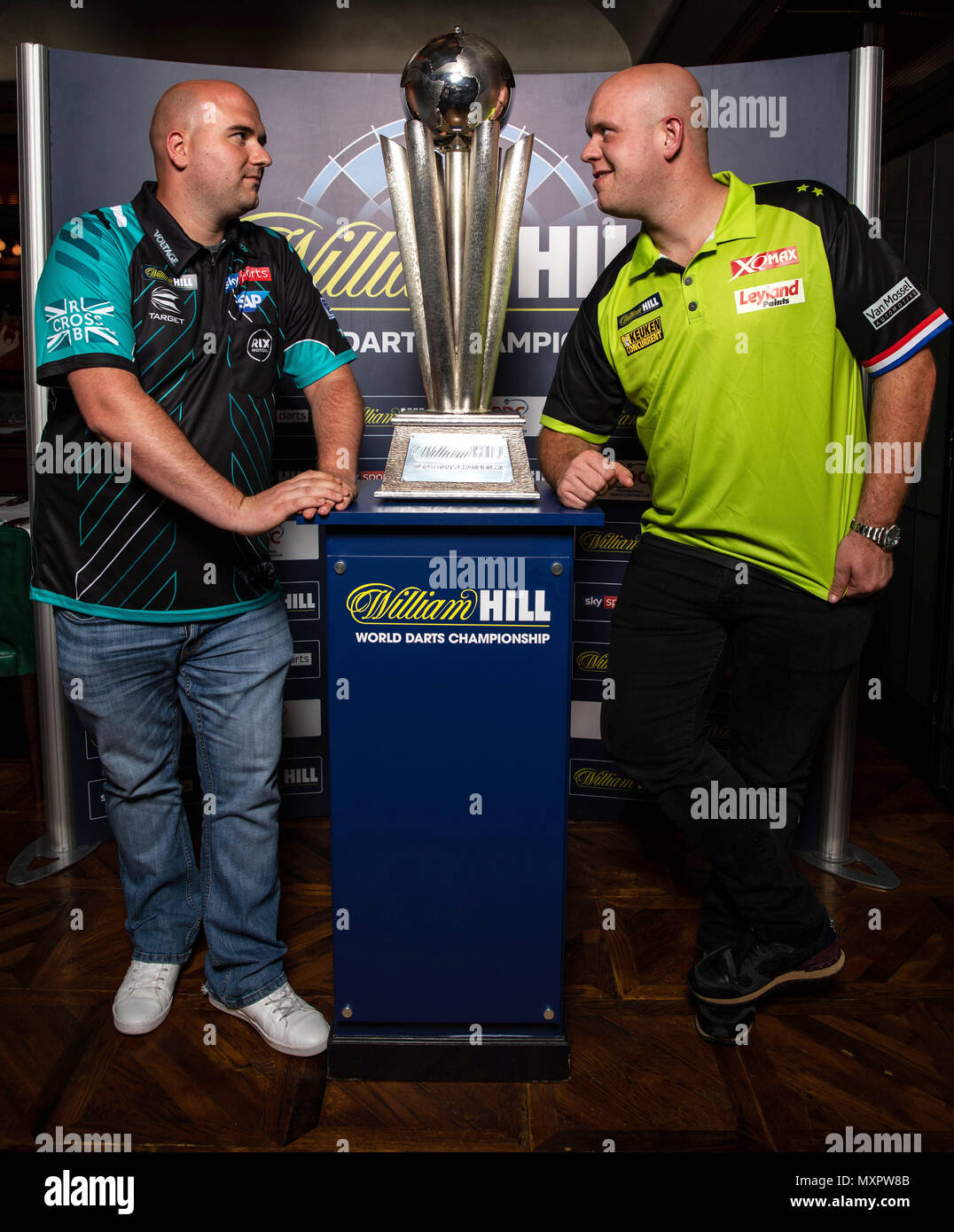 Current William Hill World Champion Rob Cross (left) and current world no.1  Michael van Gerwen pose during the photocall at Smith & Wollensky  Restaurant, London. PRESS ASSOCIATION Photo. Picture date: Monday June