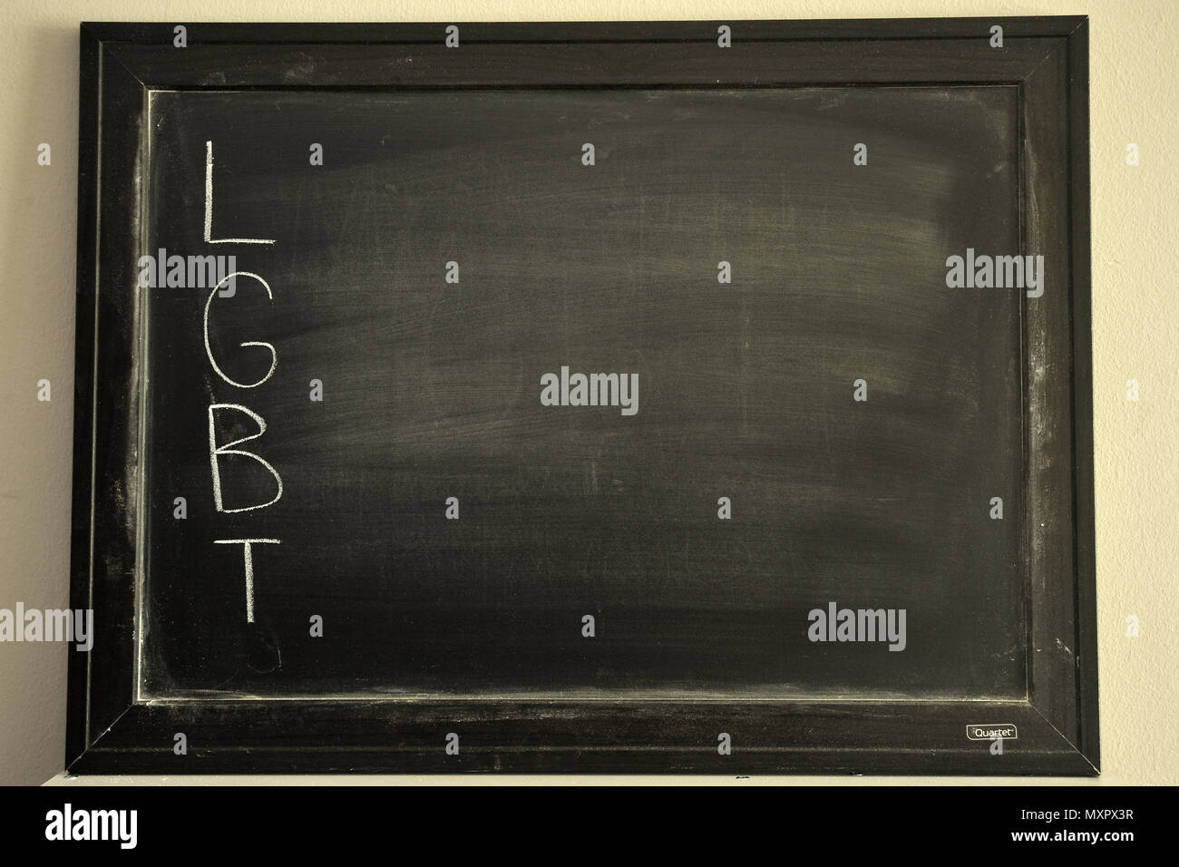 LGBT written in white chalk on a blackboard Stock Photo
