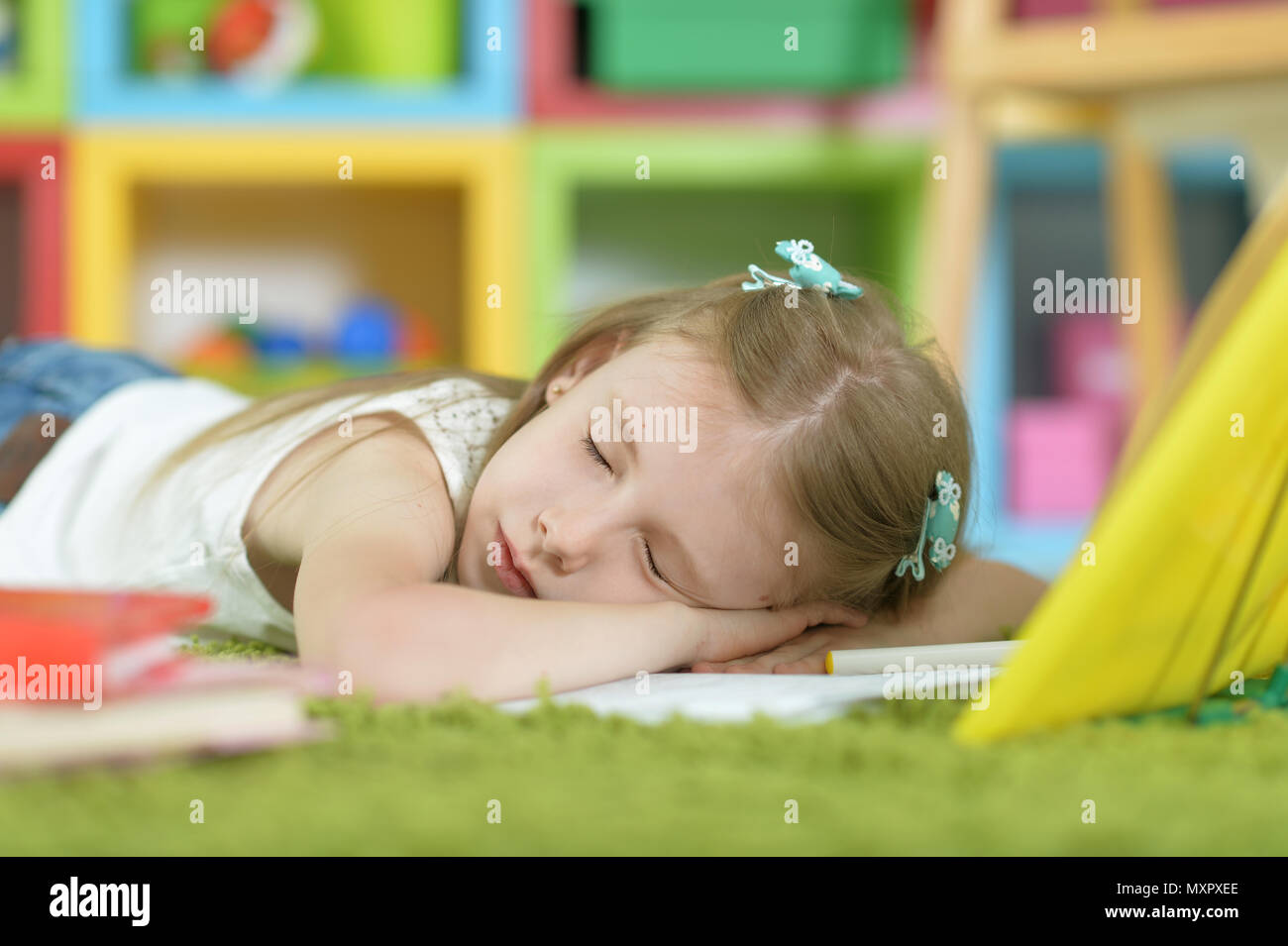 Tired schoolgirl sleeping Stock Photo