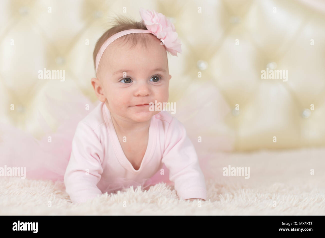 Cute charming girl in pink dress Stock Photo - Alamy