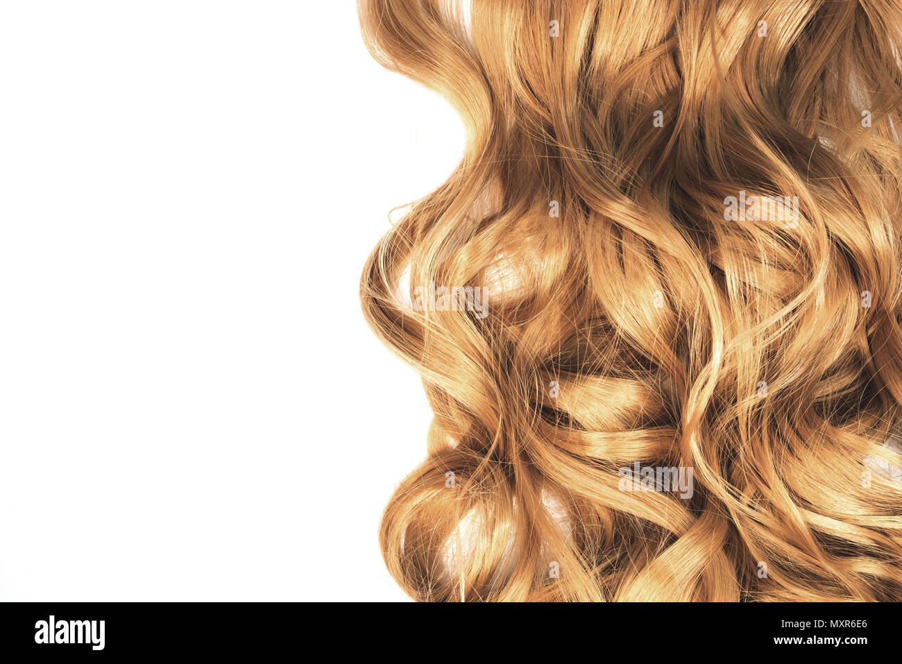 long blond wavy hair on white background Stock Photo