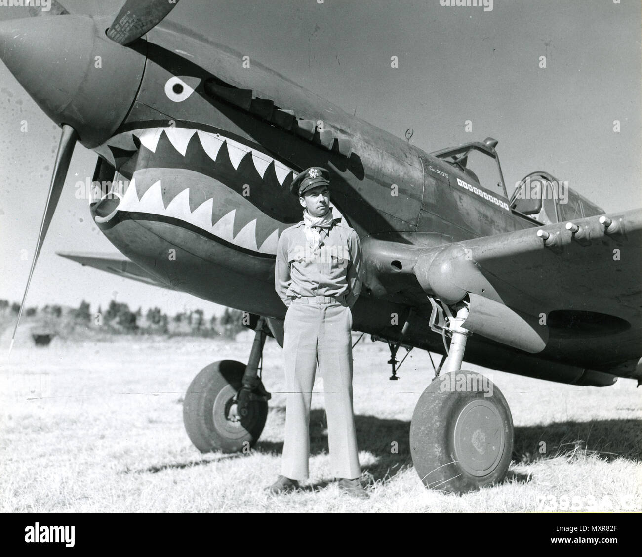 Kunming, China, 4 January 1943 - Col Robert L. Scott, Commanding Officer of the 23rd Fighter Group, stands beside his Custiss P-40 before his departure to the United States. Stock Photo