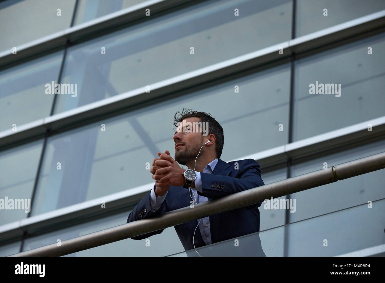 Wide shot man on balcony hi-res stock photography and images - Alamy