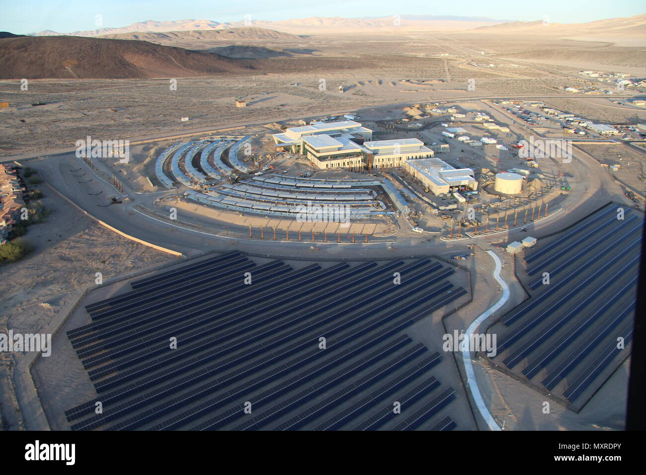 Construction of the new Fort Irwin Weed Army Community Hospital at Fort Irwin, California, is more than 80 precent completed.  A 7.6 acre  photovoltaic (PV) array and a solar thermal array, will generate 2.4 megawatts of power and the solar thermal array will provide a majority of the hot water the hospital requires.   The new hospital project consists of a 216,000 square foot hospital facility which will provide Soldier and family patient care, emergency medicine, and a wide variety of clinical support. Additionally, the project includes a 9,000-square-foot renovation of the Mary E. Walker Ce Stock Photo