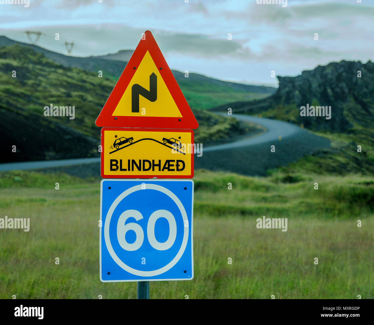 Warning traffic sign, Blind Curve Ahead, Speed 60, Iceland Stock Photo