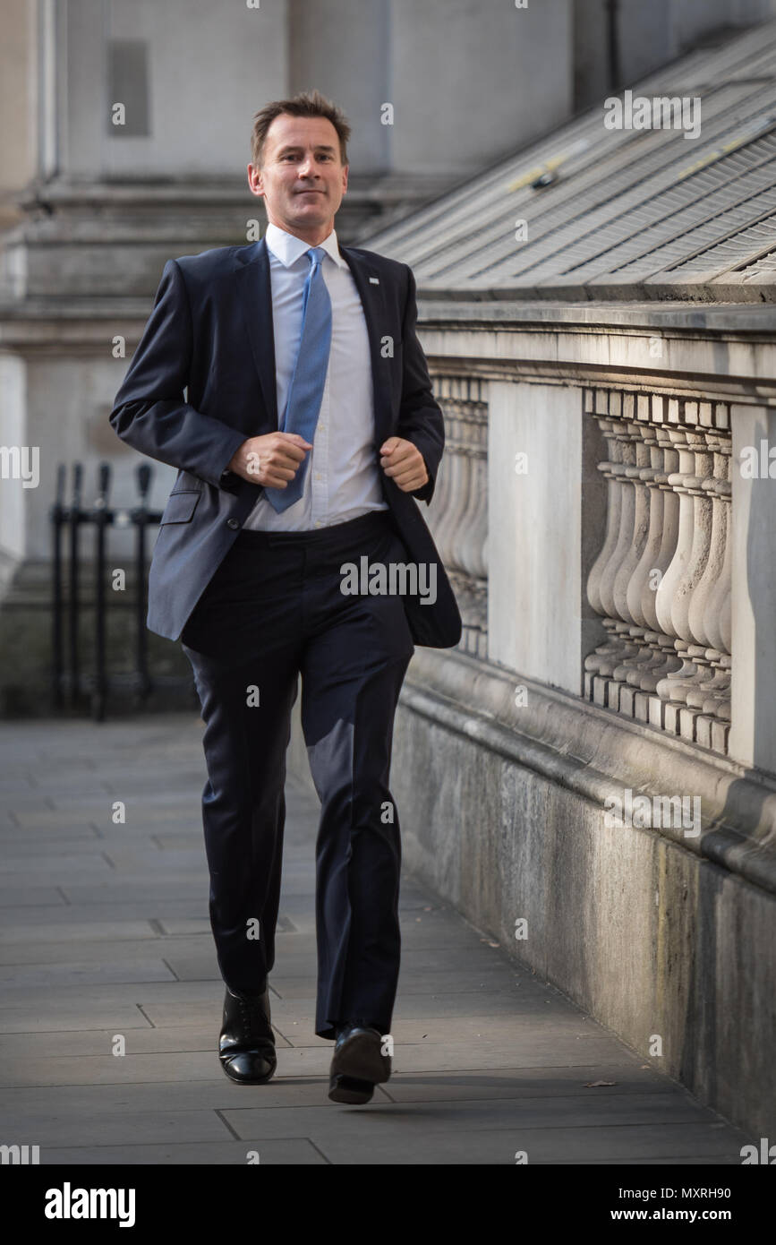 Whitehall, London, UK. 13th September 2016. Secretary of State for Health Jeremy Hunt runs along Whitehall on his way to Downing Street to attend the  Stock Photo