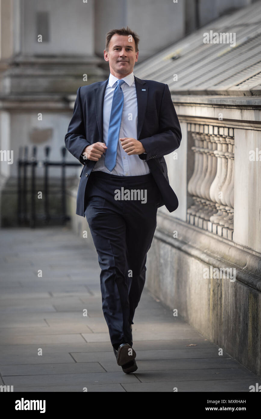 Whitehall, London, UK. 13th September 2016. Secretary of State for Health Jeremy Hunt runs along Whitehall on his way to Downing Street to attend the  Stock Photo