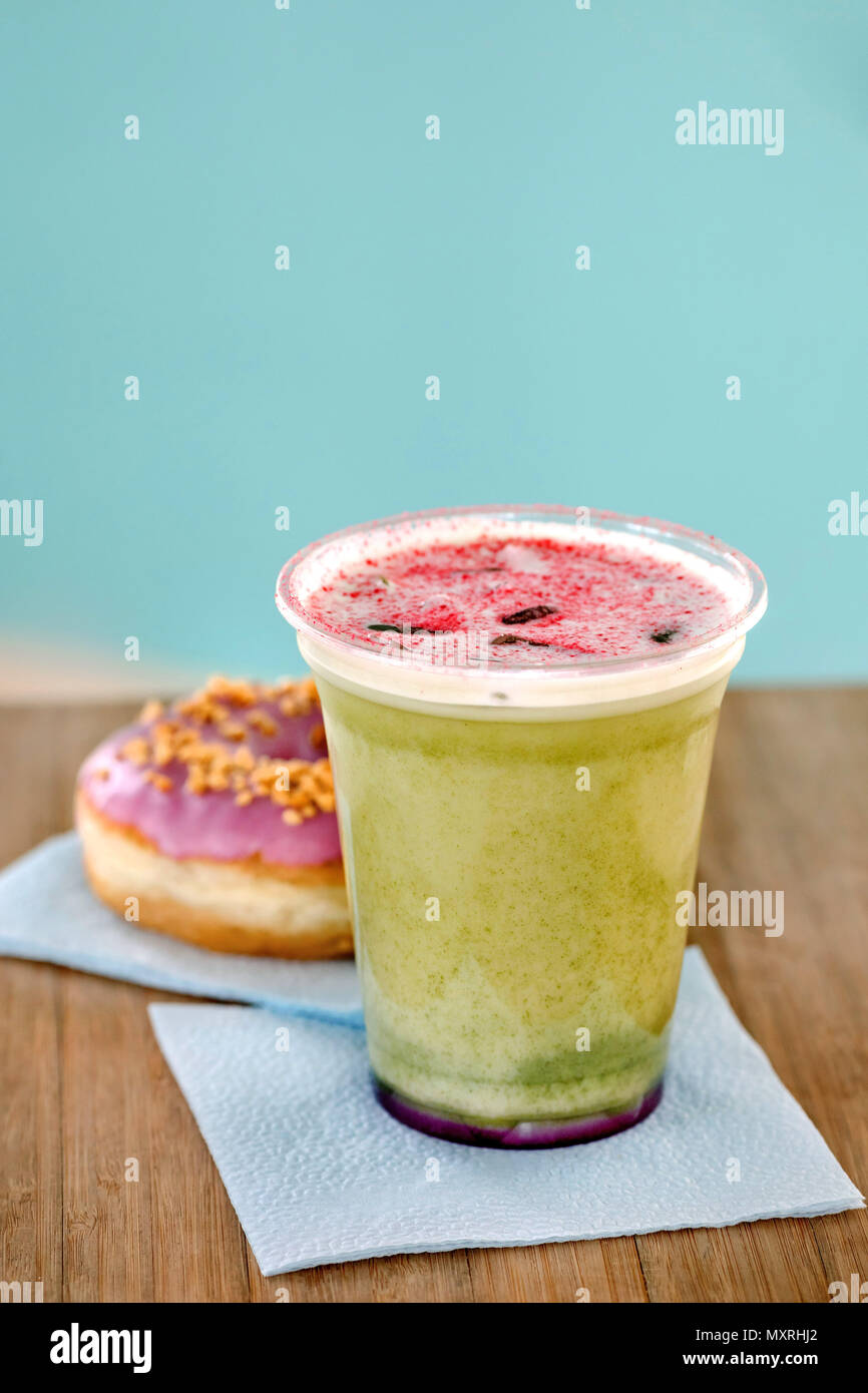 Green tea matcha smoothies in a plastic cup Stock Photo